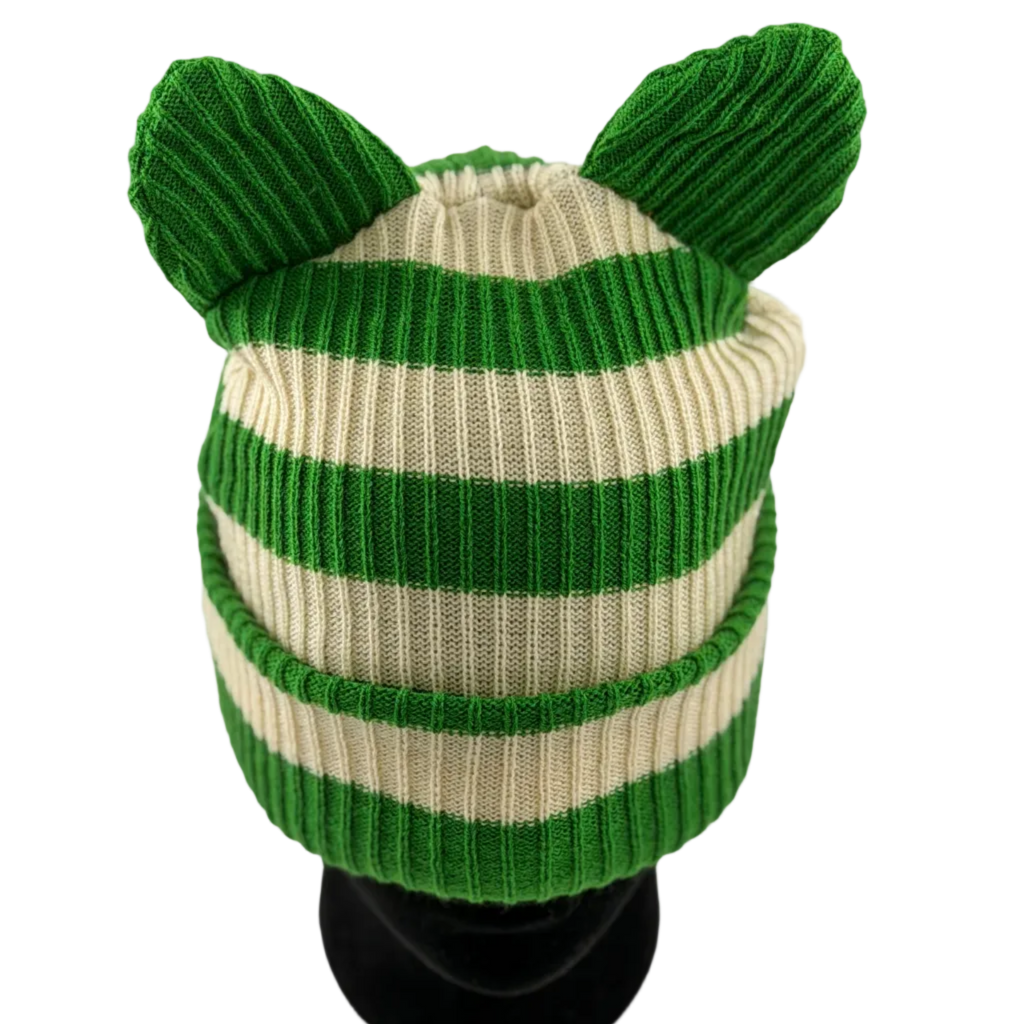 Green and beige striped knit hat with ear-like extensions on a white background